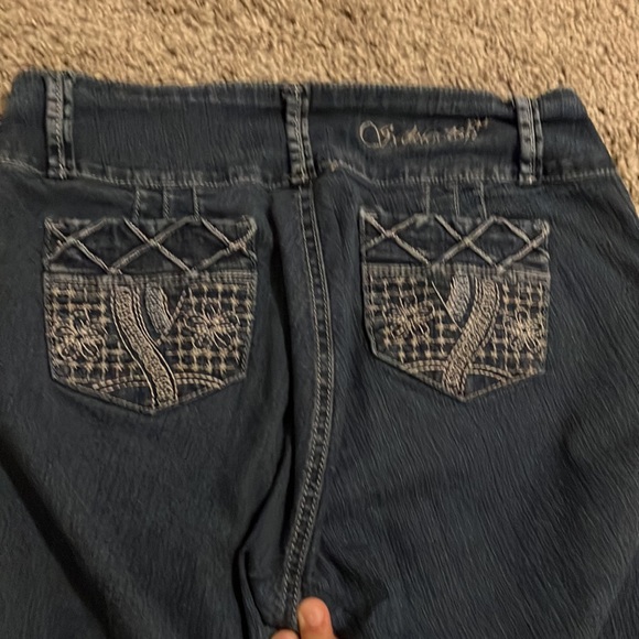 Two pairs of jeans.Both are brand new with no tags.Have cool designs aswell. - Picture 4 of 8